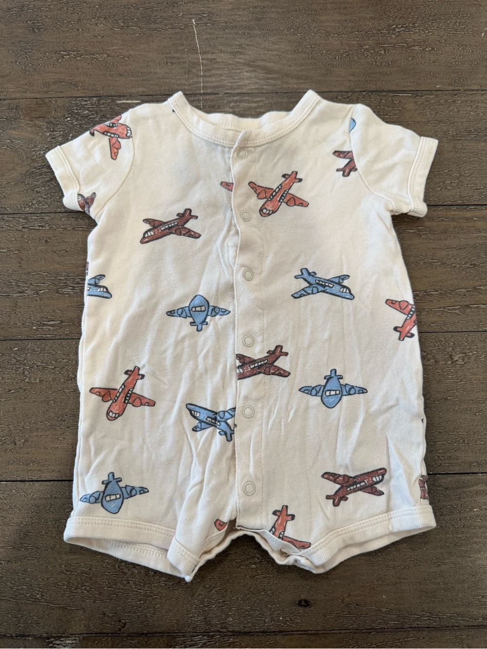 Carter's White Short-Sleeve Romper with Blue & Red Airplane Print